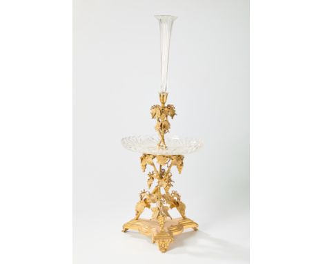 A Victorian gilt-metal epergne, mid-19th century, retailed by Mappin Brothers, cast with vine leaves and grapes, the undersid