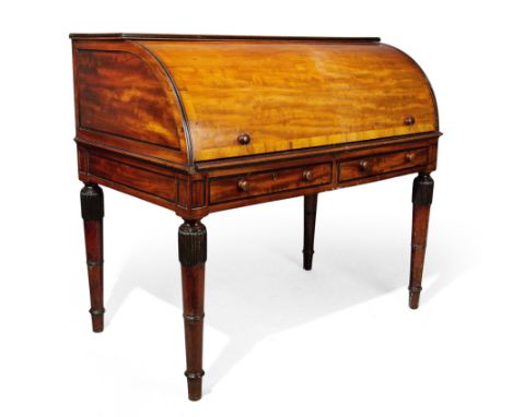 A George III rosewood crossbanded mahogany cylinder desk, last quarter 18th century, the roll top with fitted interior, above