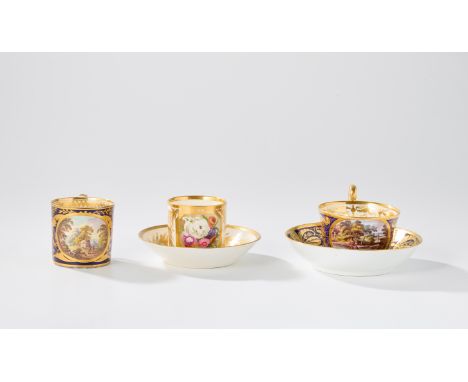 Three English porcelain cups and two saucers, c.1815-20, comprising: a Derby coffee-can and saucer, c.1815, puce crossed bato