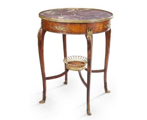A French ormolu-mounted parquetry and kingwood circular occasional table, in the manner of François Linke, first quarter 20th