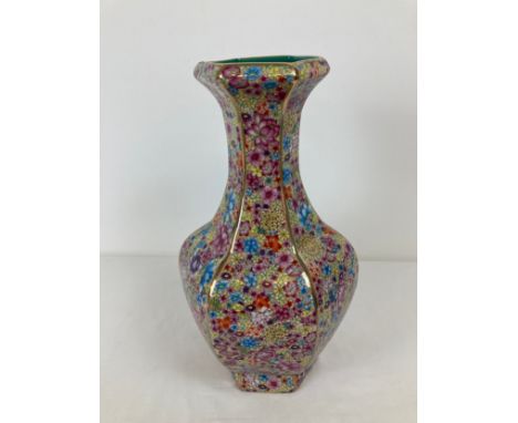 A large Chinese ceramic hexagonal shaped vase with chintz design glaze, turquoise glazed interior and gilt trim. Blue seal ma