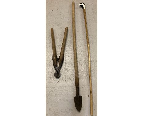 3 vintage and wooden tools to include a long handled stick with painted badgers head.  