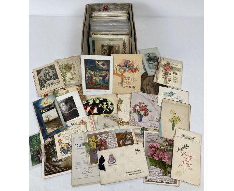 A quantity of assorted Edwardian and vintage postcards. To include: greeting cards, humorous, photographic portraits, militar