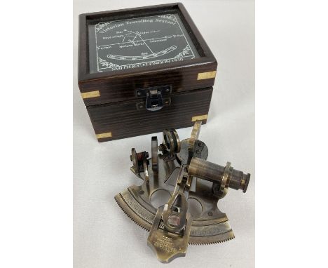 A replica wooden and glass lidded box containing a "Victorian Travelling Sextant" by Smith &amp; Co. Glass box lid has etched