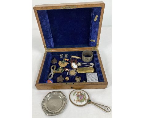 A wooden box containing a mixture of vintage items to include a Limoges hand mirror, Fattorini enamel Ivy Leaf award medal, Y