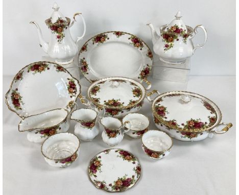 A quantity of Royal Albert first quality "Old Country Roses" tea and dinner ware. Comprising: Teapot, teapot stand, milk jug,