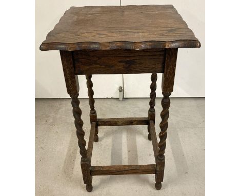 A vintage oak hall/occasional table with barley twist legs and pie crust edge top. Approx. 73 x 45 x 45cm.  