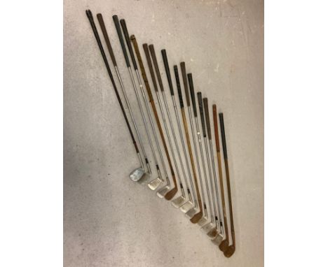 A collection of vintage hickory and metal handled golf irons in varying sizes and conditions. To include Wm. Fernie Troon, An