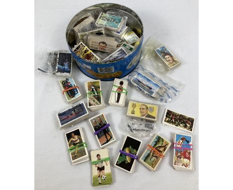 A tin of assorted vintage Brooke Bond tea cards &amp; Black Cat Craven cigarette cards.  