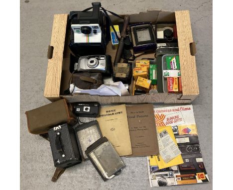 A box of assorted vintage camera equipment &amp; ephemera. To include a Poleroid Instamatik camera, Kodak box Brownie and a P