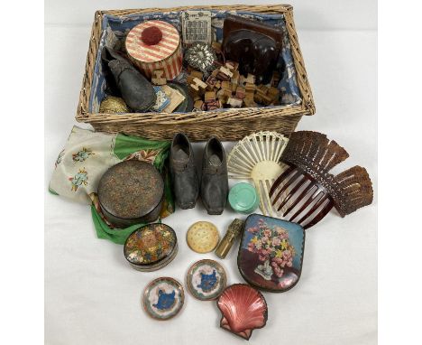 A basket containing a mixed collection of vintage items. To include silk scarf, decorative hair combs, children's leather clo