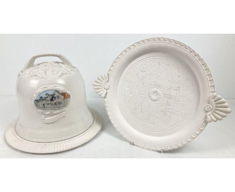 A white ceramic Stilton cheese dome featuring The Bell Inn, Stilton and dated 2005 (a/f). Together with a Richard Landy, Made