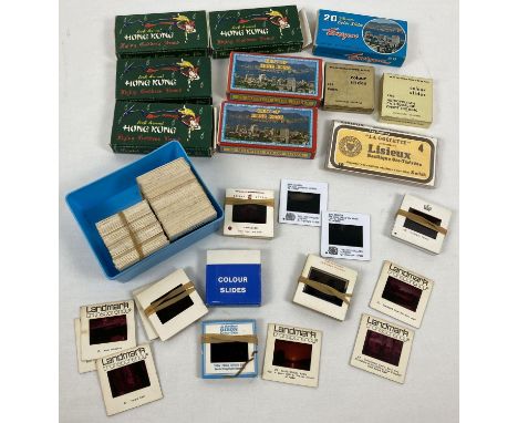 A box of assorted vintage souvenir photographic slides to include Hong Kong, France &amp; Scotland. Lot contains 7 boxed sets