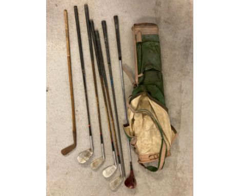 A vintage canvas pencil golf bag with a 6 vintage golf clubs (and 1 club handle) to include Willie Fernie Troon hand forged p