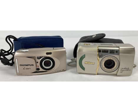 An Olympus I zoom 75 Multi AF camera with case together with a Nikon Lite Touch Zoom 140ED AF camera with case.  