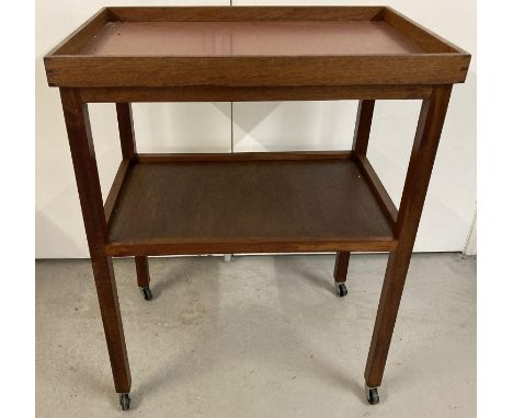A vintage teak 2 tier tea trolley, top shelf is a removeable butlers tray. Approx. 89 x 69 x 46 cm.  