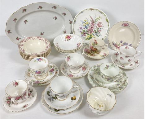A quantity of vintage bone china tea ware with floral patterned decoration. To include Coalport, Myott and Royal Albert.  