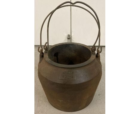 A large vintage cast iron 6 pint Kendrick glue pot with swing handle. Approx. 23cm tall x inner pot 21cm diameter.  