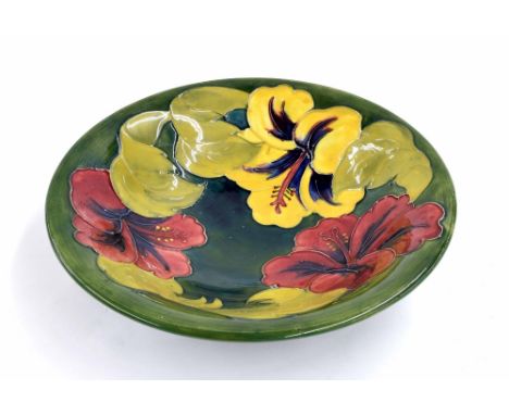 Moorcroft Pottery 'Hibiscus' pattern circular dish, impressed factory mark underside, 10" diameter
