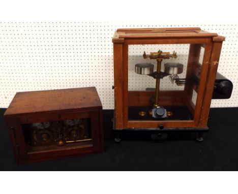 Horstmann timer in two units, within a mahogany case, together with a Stanton analytical balance (incomplete lacking beam) (2