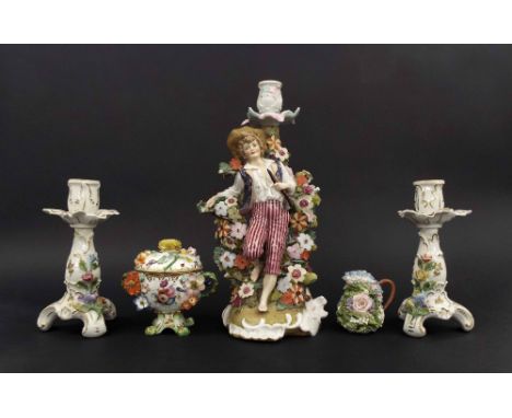 Pair of Dresden porcelain floral encrusted candlesticks, 6.75" high; Continental porcelain figural candlestick modelled with 