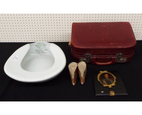 Grimwade's Original Perfection bed pan; together with a red leather fitted carry case, pair of souvenir embroidered boots and
