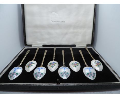 A Set of 8x Silver Gilt and Enamel Coffee Spoons, Enamelled on a Guilloche Ground, of Two Different Floral Designs, in a Leat