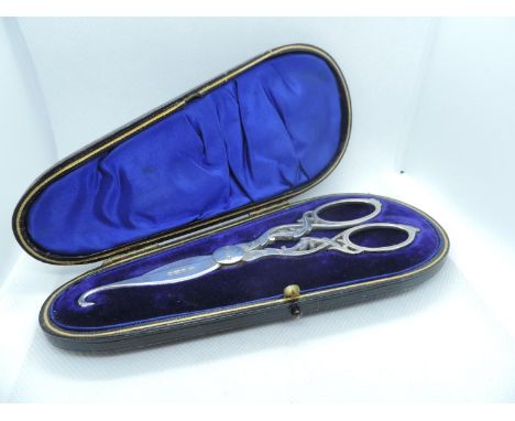 A Pair of Cased Silver Grape Scissors Bright Cut Engraving to the Leaf Shaped Handles, in Their Original Silk Lined, Teardrop