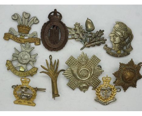 Ten mixed regimental cap / beret badges. P&amp;P Group 1 (£14+VAT for the first lot and £1+VAT for subs 