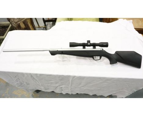 Crosman Silver Fox .22 air rifle with synthetic stock and Hawke scope, optic is clear, synthetic stock is in excellent condit