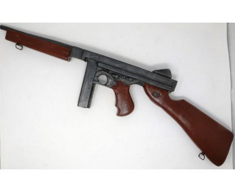 Rubber Thompson submachine film prop gun used on the set of Saving Private Ryan, calibre .45 M1, with COA. Tip of barrel dama