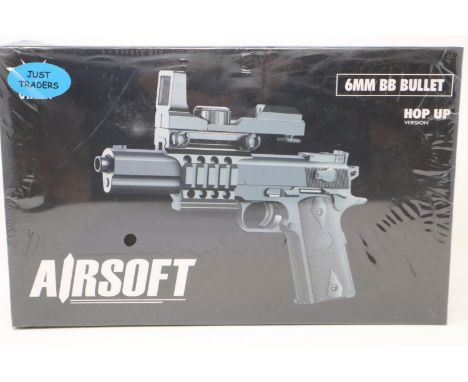 New old stock airsoft pistol, boxed and factory sealed. P&amp;P Group 2 (£18+VAT for the first lot and £3+VAT for subsequent 