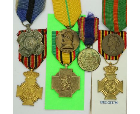 Seven Belgian awards and medals, including silver grade Order of Leopold II, and King Alberts Jubilee medal 1934. P&amp;P Gro