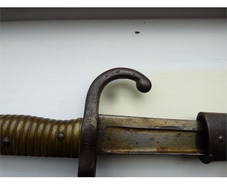 Good 19thC bayonet engraved St. Etienne 1872 both scabbard and bayonet stamped P39716 also crown over D
