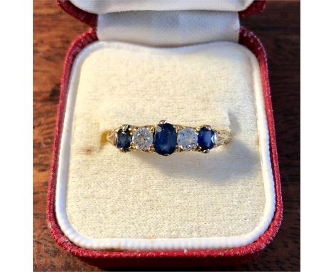 Good quality 18ct gold sapphire and diamond ring Q/R