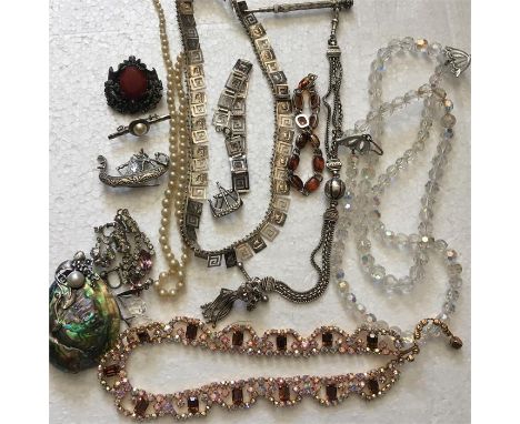 A quantity of vintage jewellery to include silver watch fob, pencil, 9ct gold etc...