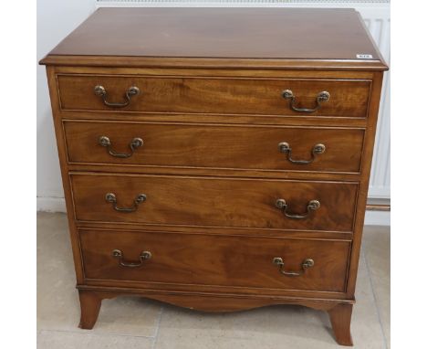 A 19th Century chest of four long graduated drawers above shaped apron raised on splayed bracket feet. 74cm wide x 44cm deep 