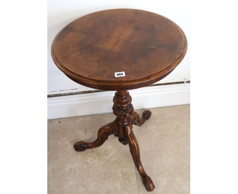 A 19th century walnut quarter veneered side table, circular top over single pedestal terminating in tripod base. 50cm dia. x 