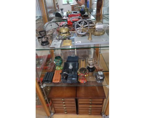 A selection of miscellaneous items including a Stirling Type atmospheric engine, an altimeter, thermometer and barometer, a c