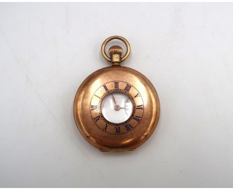 A 9ct yellow gold hallmarked cased half hunter pocket watch by J.W. Benson, approx 88.6 grams