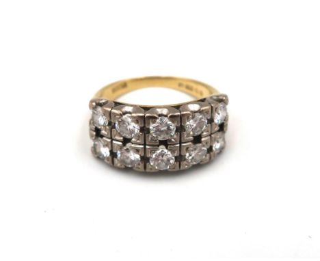 An 18ct yellow gold and diamond ring with 10 0.1ct diamonds to shoulder, approx 7.8 grams, size K/L