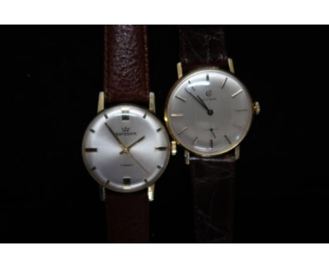 A gents Swissam manual wind watch on brown leather strap, running in saleroom, case size 34mm, together with a Cyma gents wri