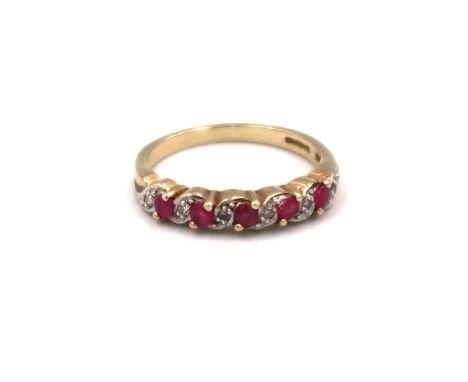 A 9ct yellow gold diamond and ruby dress ring Size N, 2.7grams