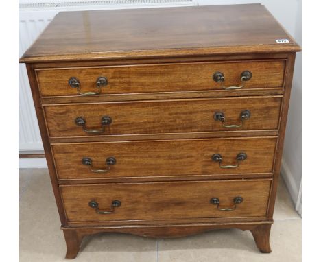 A 19th Century chest of four long graduated drawers above shaped apron raised on splayed bracket feet. 74cm wide x 44cm deep 