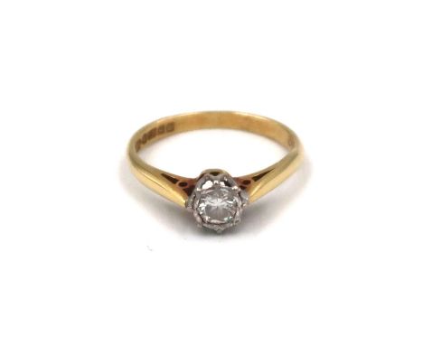 An 18ct yellow gold brilliant cut diamond solitaire ring. Estimated 0.20ct. Size K, 2.5 grams