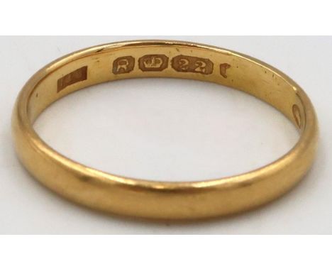 A 22ct band ring, size K, weight 2.22 grams.