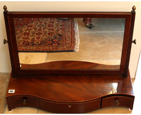 A 19th Century serpentine fronted dressing mirror, mirror over three trinket drawers, (Centre drawer not opening.)