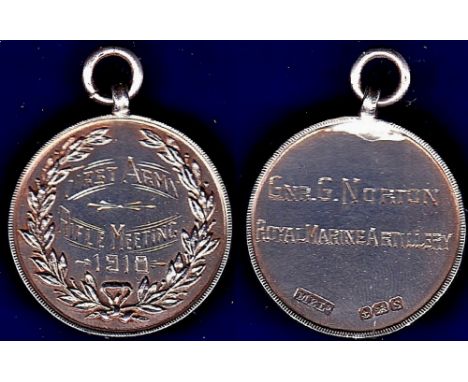 Medal - "First Army Rifle Meeting 1910"  Awarded to Gur. G. Norton, N.M.A. Hallmarked Silver.  Clean undamaged item.