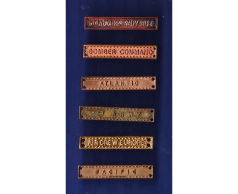 A collection of Medal clasps WWI and WWII, mostly tailors replacements for the medals including: 5th AUG.-22nd NOV 1914, Atla