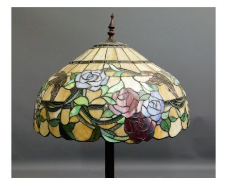 A Tiffany style standard lamp with coloured glass shade &amp; dragonfly base, small area of damage &amp; repair to finial, 64